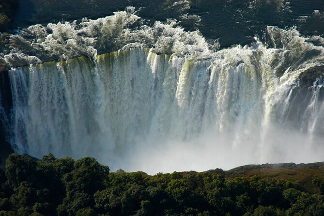 15 minutes scenic helicopter flight above Victoria Falls-Zimbabwe - Pickup and return keep the timing simple