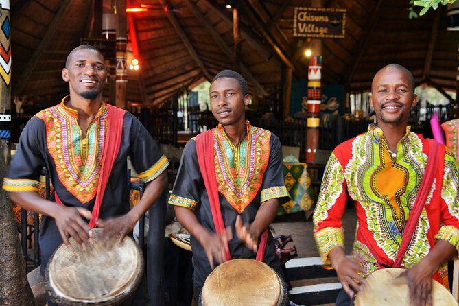 Boma Dinner, Dance and Drum Show in Victoria falls Town - Chitenge robes set the tone