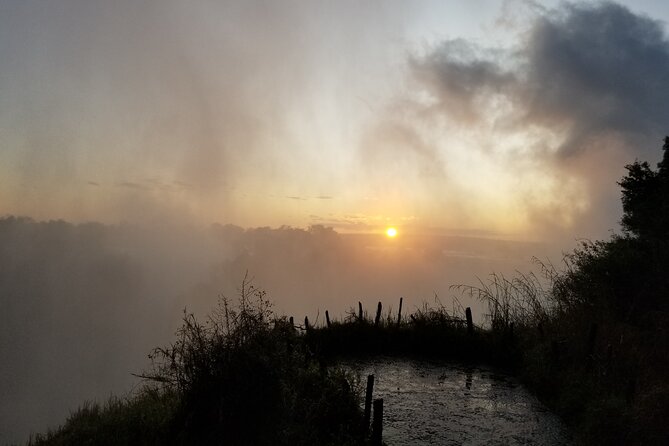 Guided Falls Tour & Zambezi River Cruise Combo - Two days, two ways to meet Victoria Falls