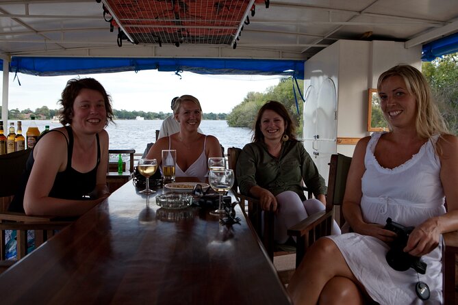 Guided Falls Tour & Zambezi River Cruise Combo - The baobab, Livingstone, and the bridge