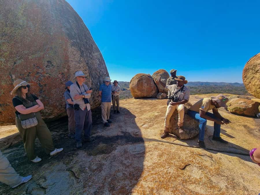 Matobo Hills Day Trip with Rhino Tracking - Tracking white rhinos on foot