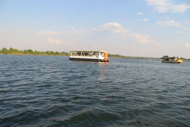 Sunset Cruise & Guided Falls Tour Combo - Snacks, drinks, and the feel of the boat