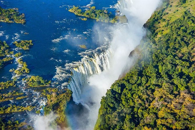 Victoria Falls Guided Tour with Hotel Pickup - Pickup, timing, and the private format