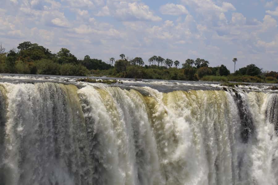 Victoria Falls: Private Guided Tour of the Waterfalls - The Smoke That Thunders Is a Wet Experience
