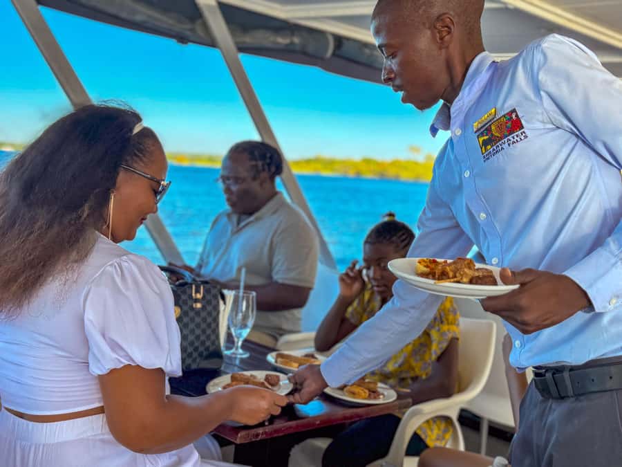 Victoria Falls: Sunset Cruise on the Zambezi River - Boarding the boat and settling in