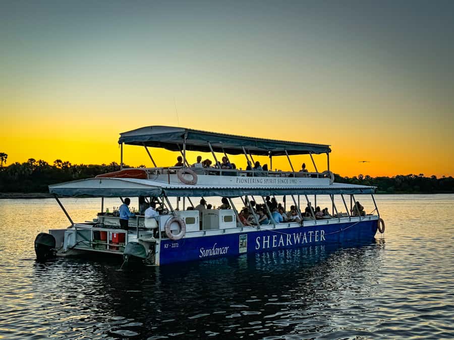 Victoria Falls: Sunset Cruise on the Zambezi River - Guides, stories, and the history of the river